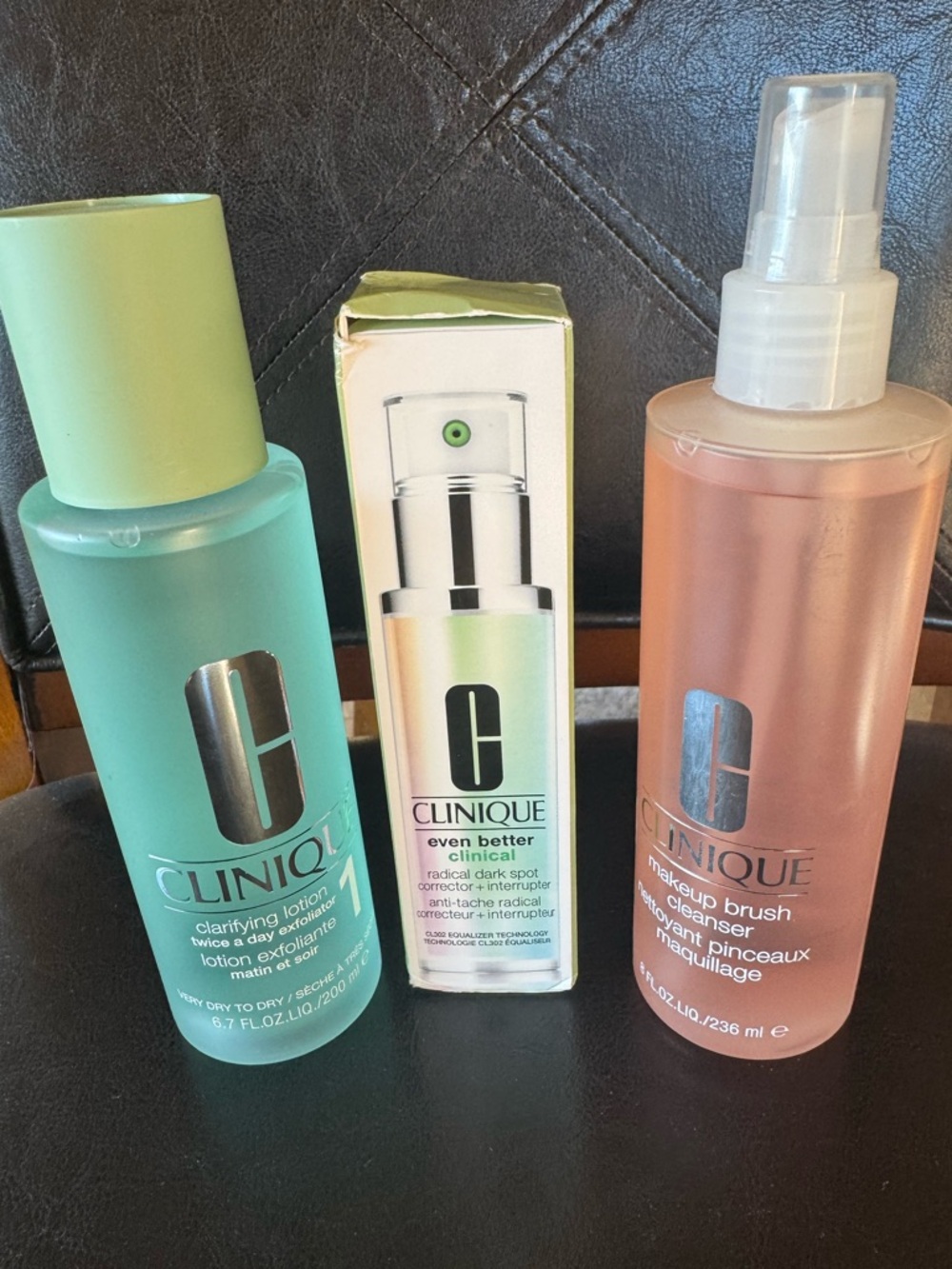 Clinique 3 Pc Bundle-exfoliating toner, a brightening serum, & a Brush cleanser